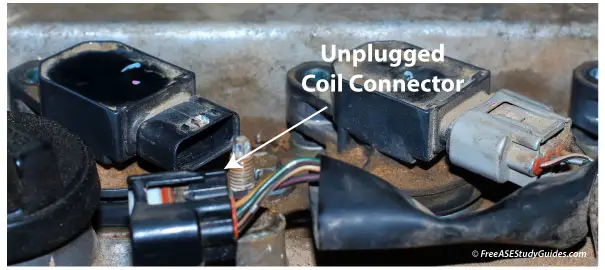 Unplugged ignition coil.