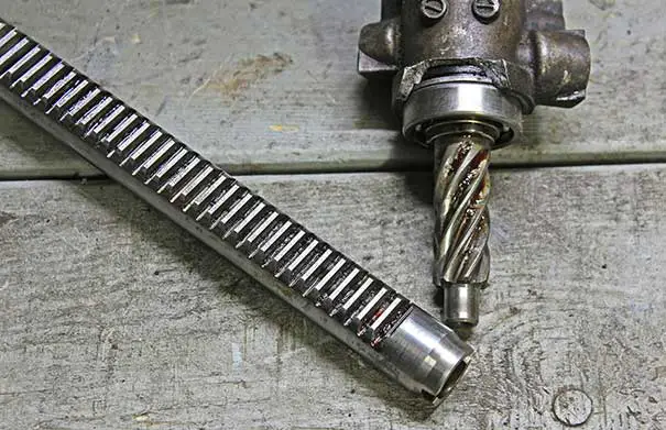 Damaged rack and pinion gear.