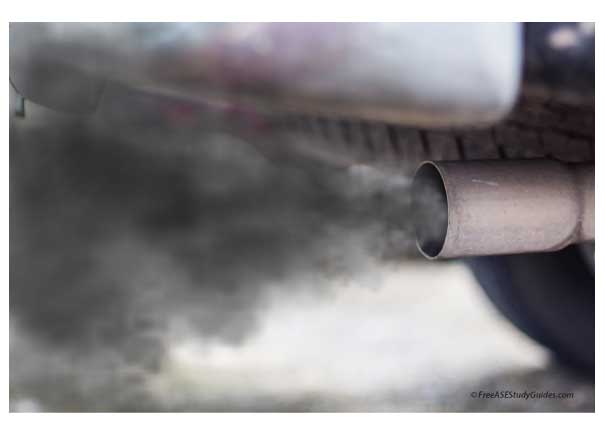 Black-colored exhaust at the tailpipe.